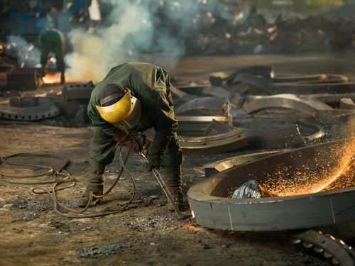 welder with safety shoes